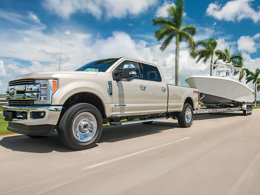 Truck towing a large boat