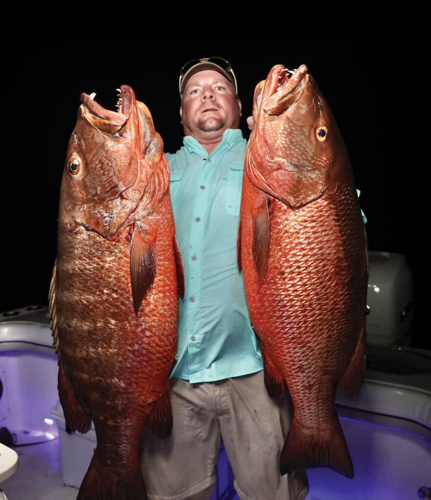Two large cubera snapper caught on large live baits.