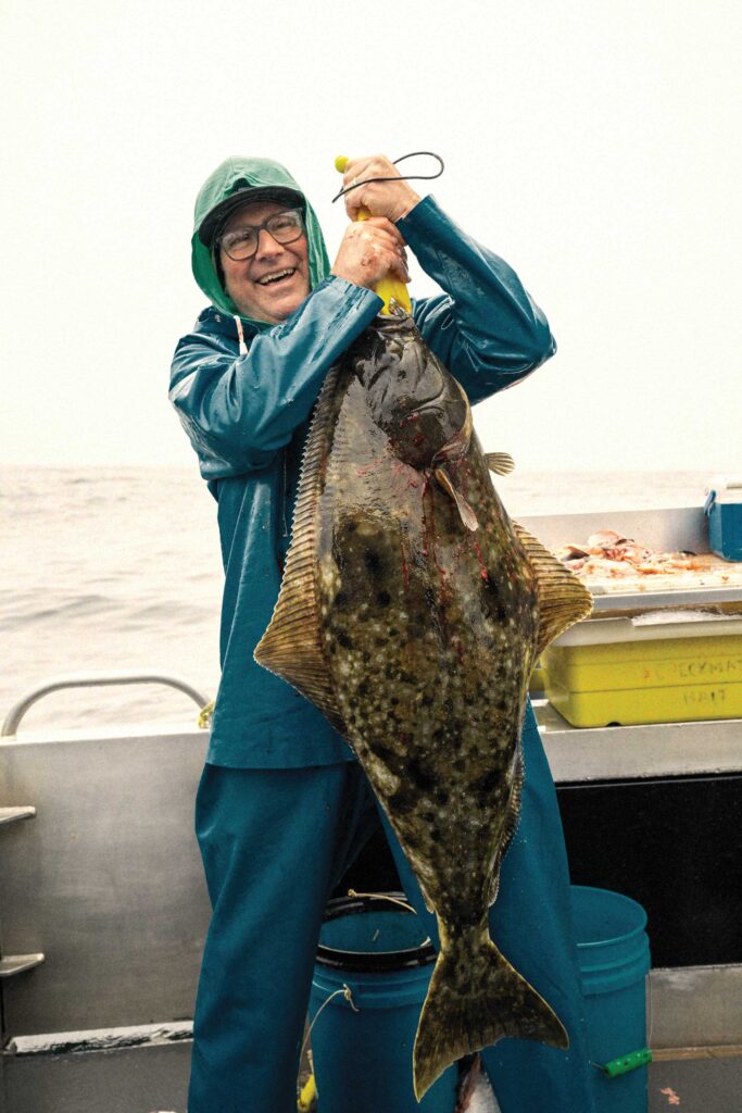 Angler with large halibut