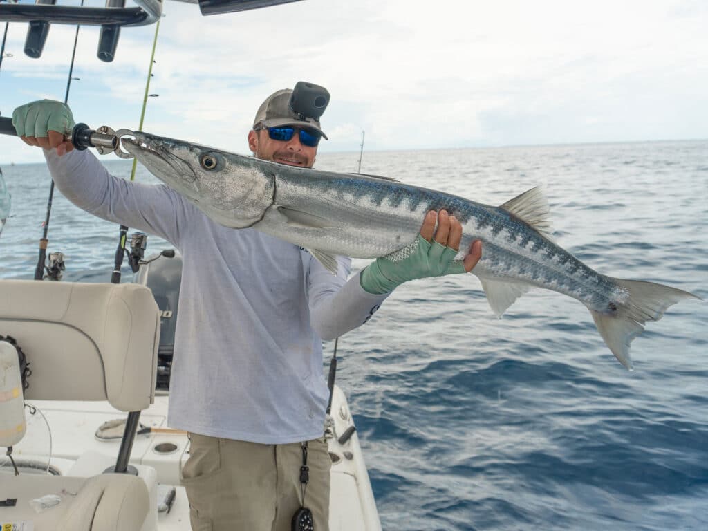 Brent Schirmer with a barracuda